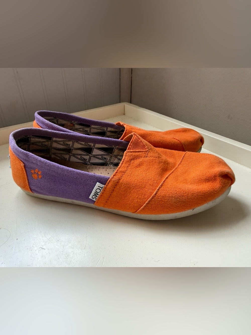 Toms Orange Canvas Slip-Ons with Purple Trim Clemson Logo
